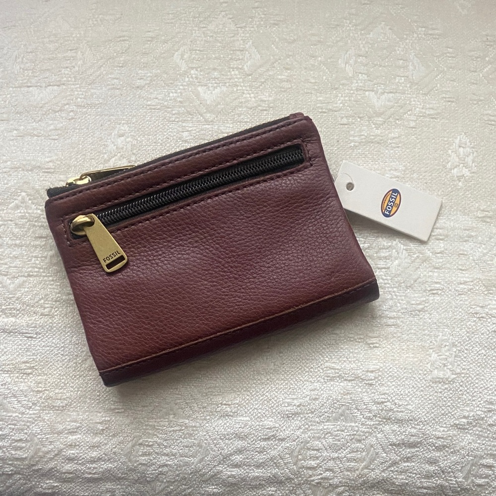 Real Leather Wallet with Gold Hardware. New with tags. By Fossil